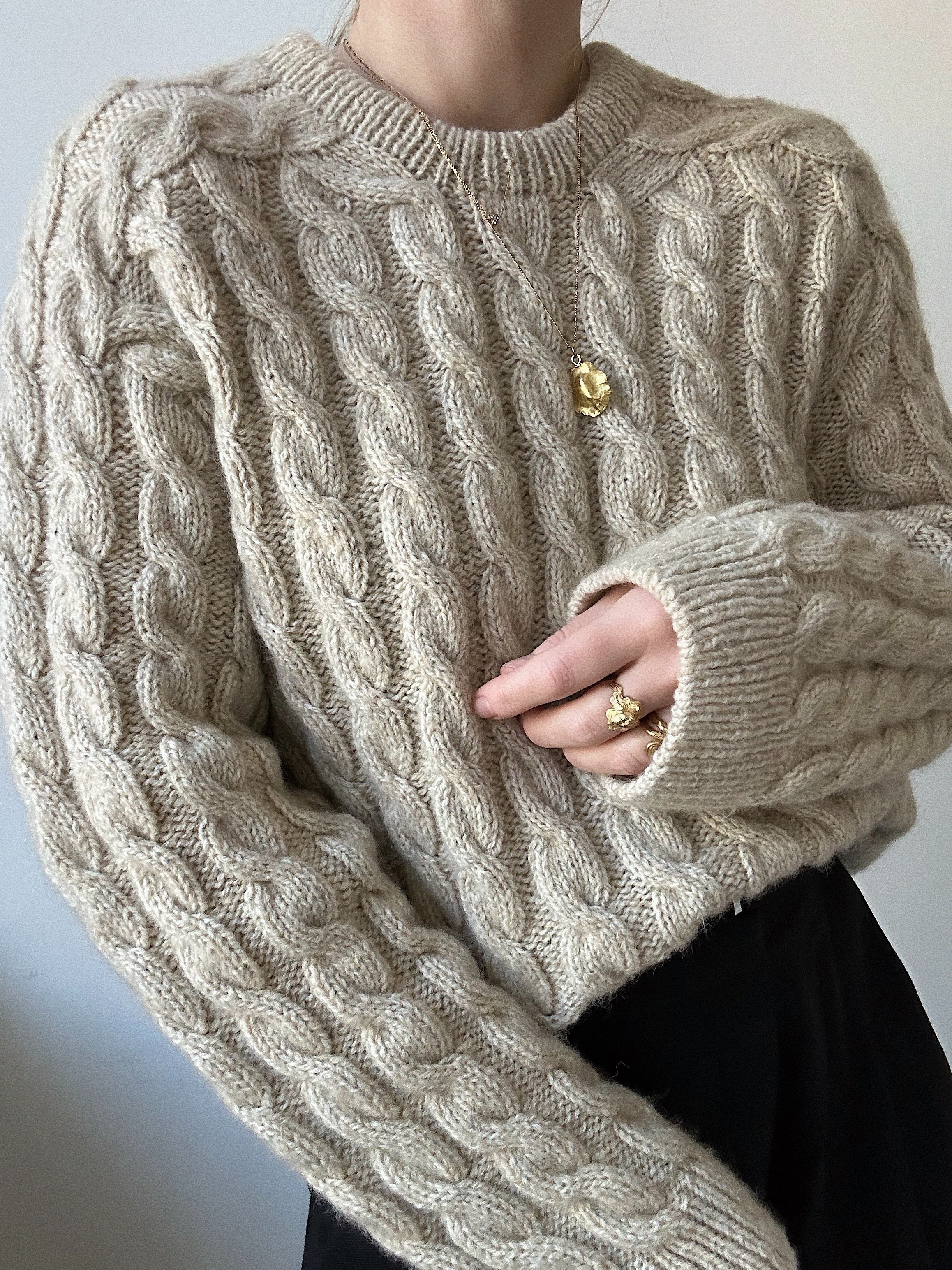 SWEATERS